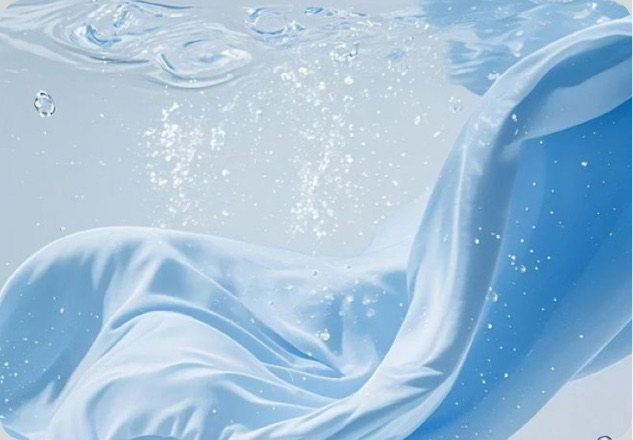 Light blue fabric moving through water