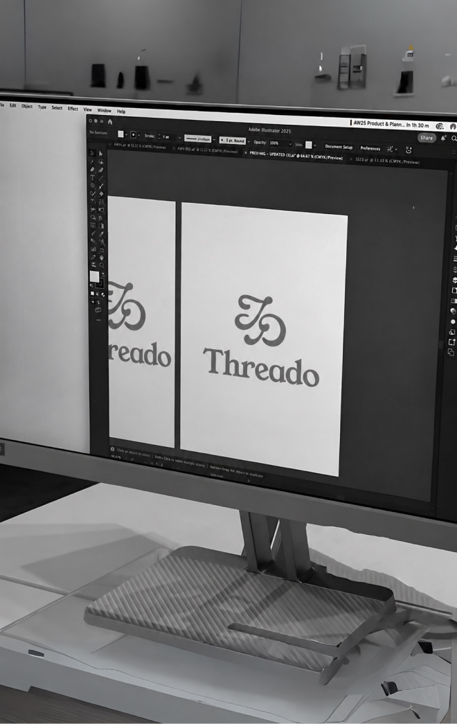 Threado logo artwork on a designer’s monitor